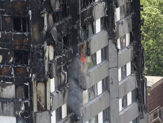 Grenfell Tower in west London is seen on Thursday, after a fire engulfed the 24-story building in the early hours of Wednesday.